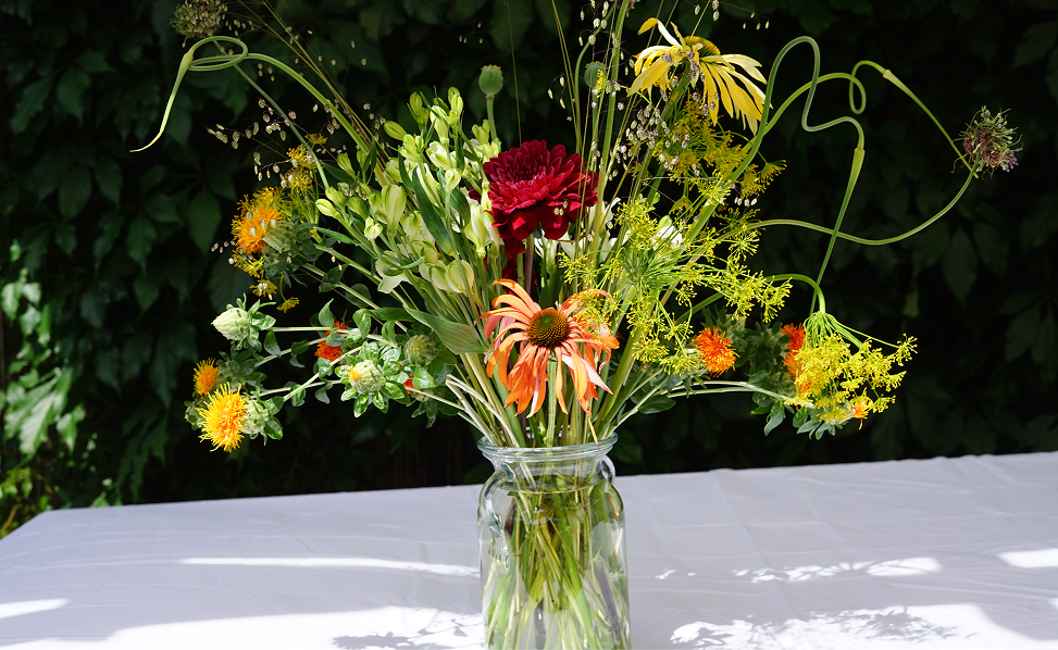 Bright floral arrangement in glass vase